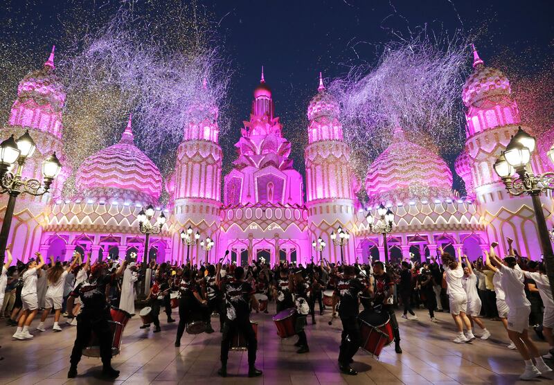 Confetti rains on visitors at the opening of season 27