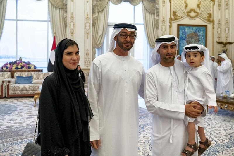 ABU DHABI, UNITED ARAB EMIRATES - October 21, 2019: HH Sheikh Mohamed bin Zayed Al Nahyan, Crown Prince of Abu Dhabi and Deputy Supreme Commander of the UAE Armed Forces (2nd L), stands for a photograph with family members who received "Amntk Bladk" token, during a Sea Palace barza.

( Hamad Al Kaabi / Ministry of Presidential Affairs )​
---