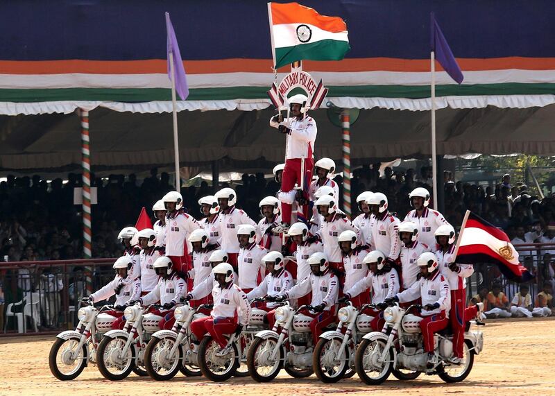 The army's ASC Tornadoes daredevil bike team performs in Bangalore. Jagadeesh NV / EPA