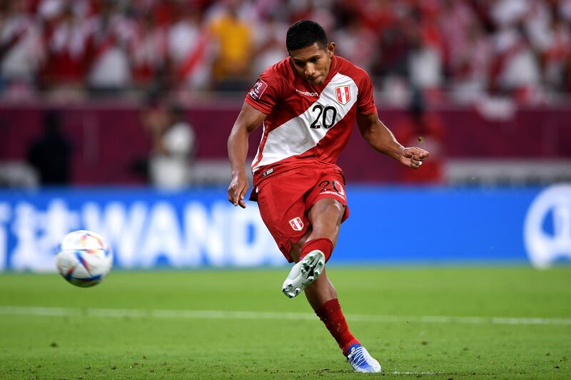 Edison Flores of Peru takes a shot at goal during the penalty shootout. Getty Images