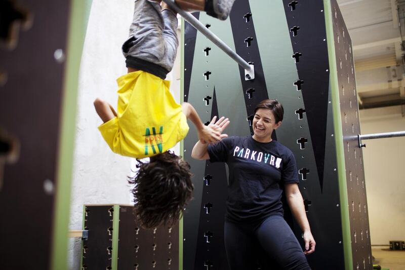 Zia Zahine, a 9-year-old home-schooled student is coached by Andrea Brooks in a Parkour workshop on December 8, 2016, in Dubai. Anna Nielsen for The National