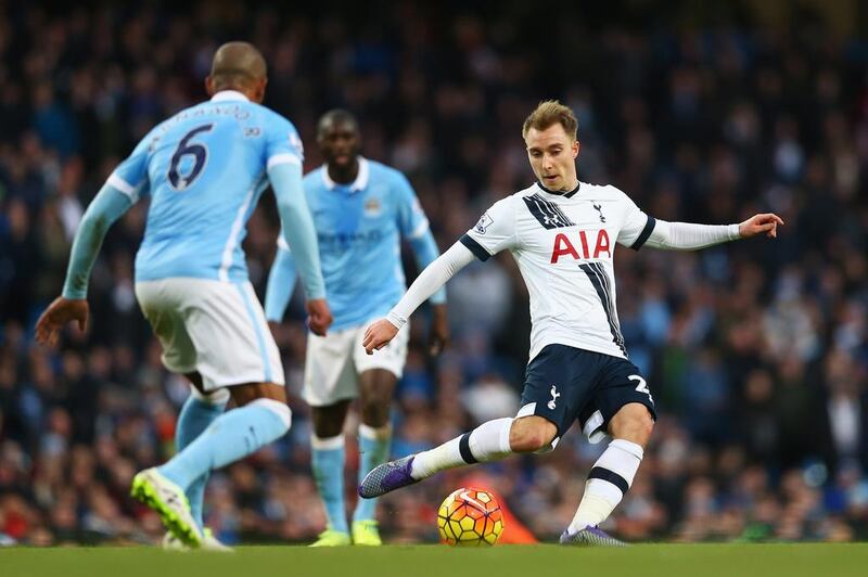 Christian Eriksen, right, of Tottenham Hotspur passes during their Premier League match against Manchester City at Etihad Stadium on February 14, 2016 in Manchester, England.  (Photo by Clive Brunskill/Getty Images)