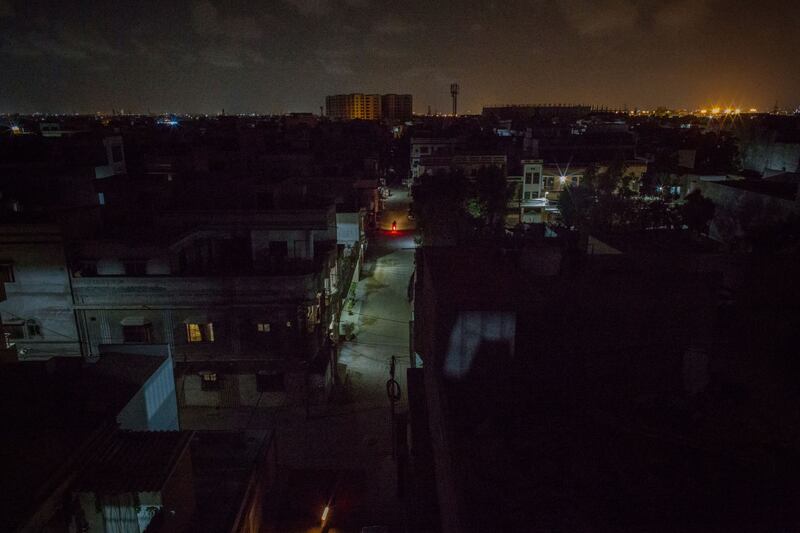 A residential area during a load-shedding power outage period in Karachi.