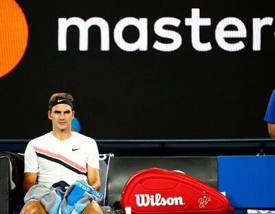 epa06450047 Roger Federer of Switzerland during a break in his second round match against Jan-Lennard Struff of Germany at the Australian Open Grand Slam tennis tournament in Melbourne, Australia, 18 January 2018.  EPA/NARENDRA SHRESTHA