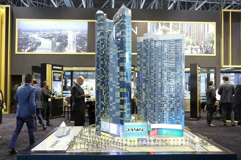 Above, a model of the Aykon City project by Damac. Pawan Singh / The National