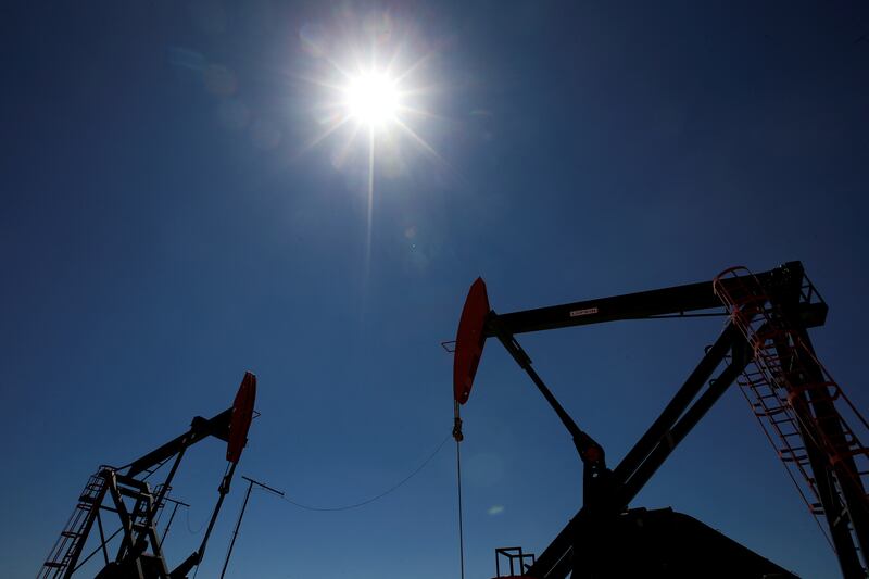 Oil pump jacks in Neuquen, Argentina. The International Energy Agency has predicted that global crude demand will hit record levels this year. Reuters