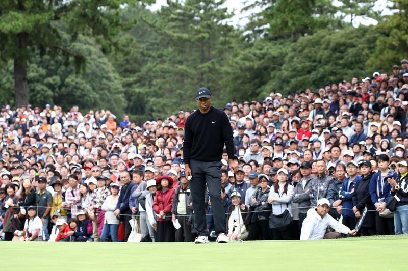 Tiger Woods watched by a huge crowd at the Zozo Championship in Japan in October. Getty