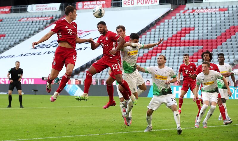 Benjamin Pavard goes for a header against Borussia Monchengladbach. EPA