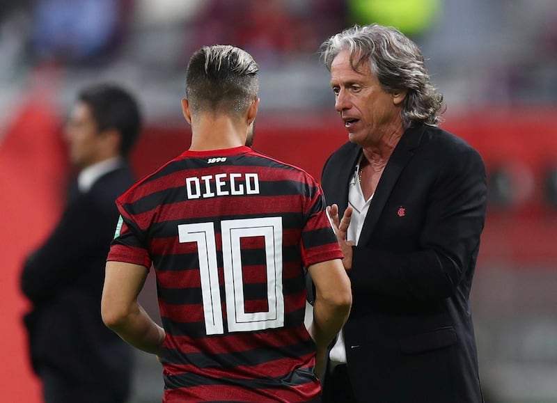 Flamengo's Diego speaks with coach Jorge Jesus. Reuters