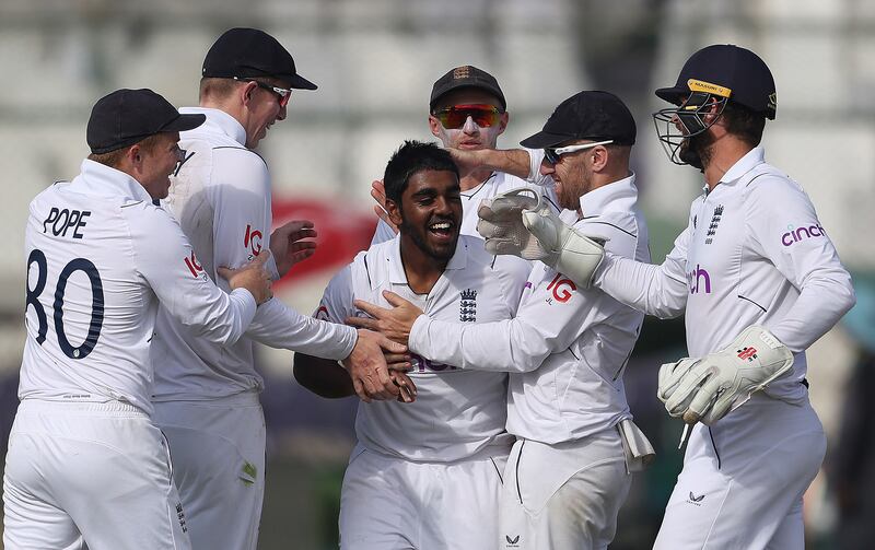 England leg-spinner Rehan Ahmed celebrates after taking the wicket of Pakistan batter Mohammad Rizwan on Day 3 of the Third Test at Karachi National Stadium on December 19, 2022. Getty