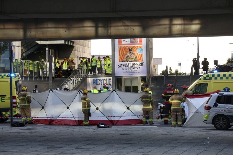 Emergency personnel arrive at Field's shopping centre. Reuters