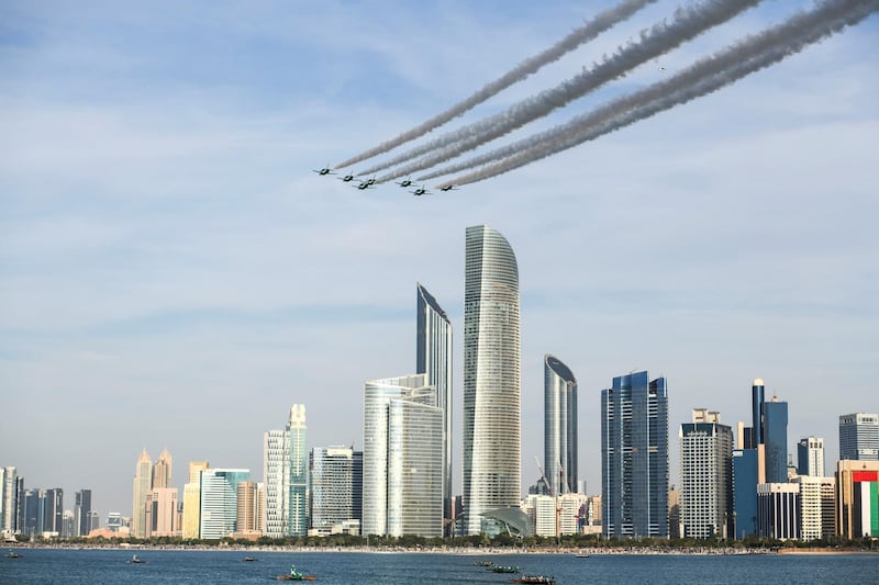 Abu Dhabi, United Arab Emirates - Al Fursan aerobatic demonstration lights up the skyline of Abu Dhabi on December 2, 2018. (Khushnum Bhandari/ The National)
