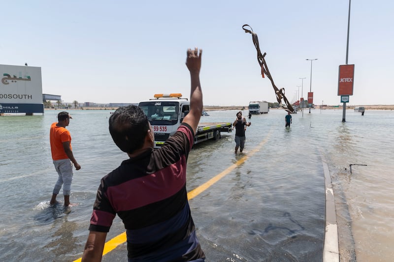 Vehicles are recovered from the Al Maktoum Airport turn on the 311 road in Dubai. Antonie Robertson/The National