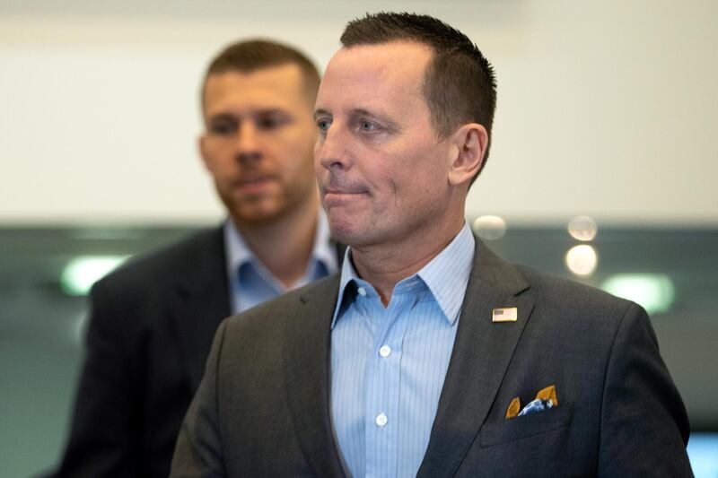 epa08111841 US Ambassador to Germany Richard Allen Grenell (R) prior to the 12th WELT economic summit at the headquarters of the Axel Springer SE in Berlin, Germany, 08 January 2020. About 60 business personalities and politicians discuss about future economic policy challenges.  EPA/HAYOUNG JEON