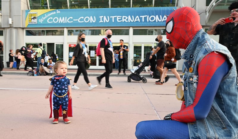 Maddox Cruz, aged 1, dressed as a superhero. AFP