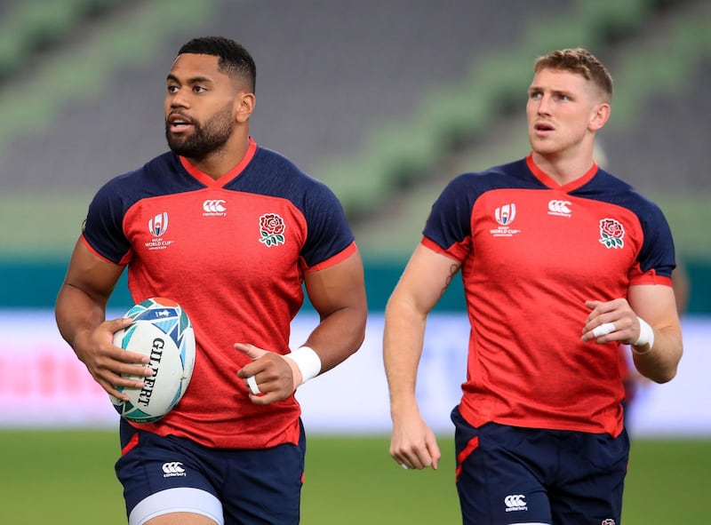 England's Joe Cokanasiga and Ruaridh McConnochie (right) during the training session at Kobe Misaki Stadium, Japan. PA Photo. Picture date: Wednesday September 25, 2019. See PA story RUGBYU England. Photo credit should read: Adam Davy/PA Wire. RESTRICTIONS: Editorial use only. Strictly no commercial use or association. Still image use only. Use implies acceptance of RWC 2019 T&Cs (in particular Section 5 of RWC 2019 T&Cs) at URL: bit.ly/2knOId6