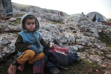 A displaced Syrian child near the town of Dana in Idlib after fleeing the Russian-backed regime offensive. AFP