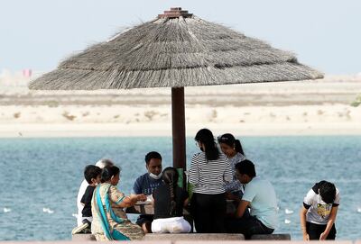 DUBAI, UNITED ARAB EMIRATES , December 25 – 2020 :- People enjoying with their family and friends on the Christmas day at Al Mamzar beach in Dubai. ( Pawan Singh / The National ) For News/Standalone/Online/Instagram