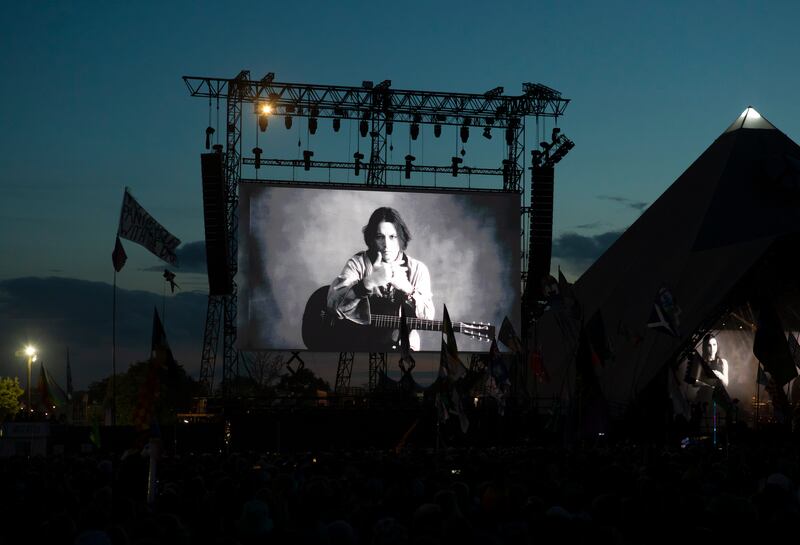 A video of Depp plays on a screen before Paul McCartney's performance on the Pyramid Stage at Glastonbury Festival in June. EPA