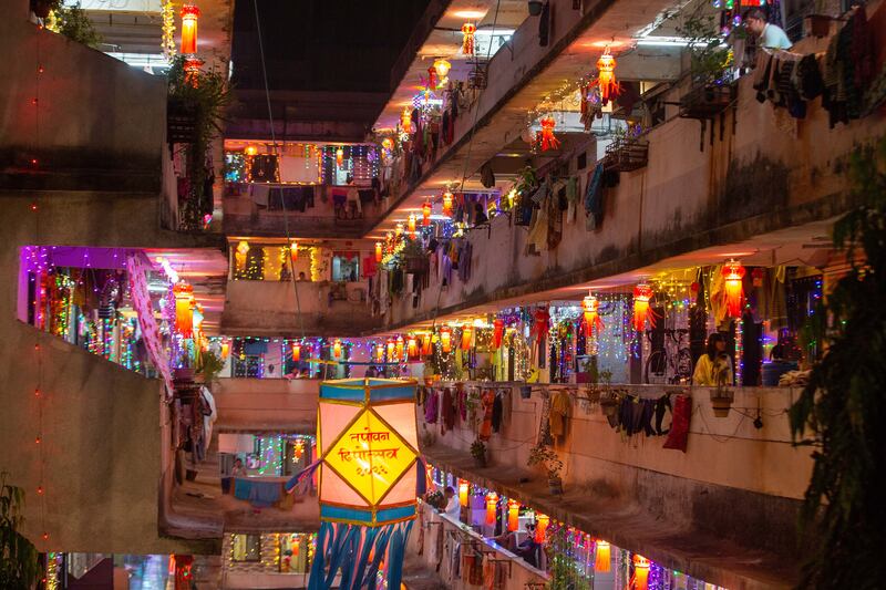 Residences are lit up with lanterns and lights in Mumbai, India. During Diwali, the entire house is cleaned and diyas, small earthen oil lamps, are lit around the house. EPA