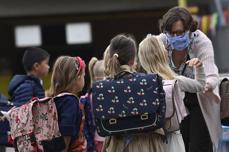 Pupils arrive for the first day of school at the Olfa Elsdonk primary school in Edegem, Antwerp, Belgium. AFP