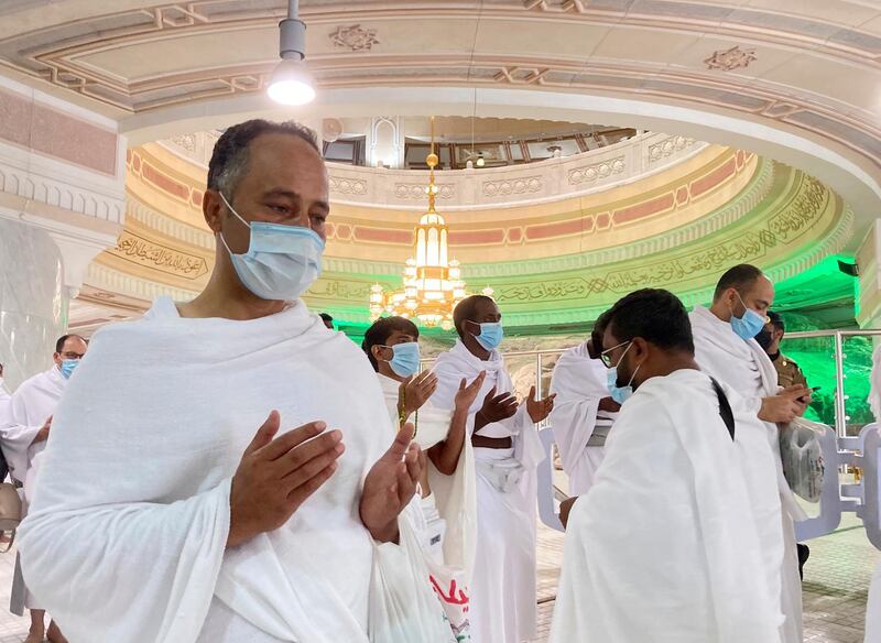 Pilgrims pray in front of the holy Al Safa mountain at the Grand Mosque in Makkah, Saudi Arabia. AP Photo