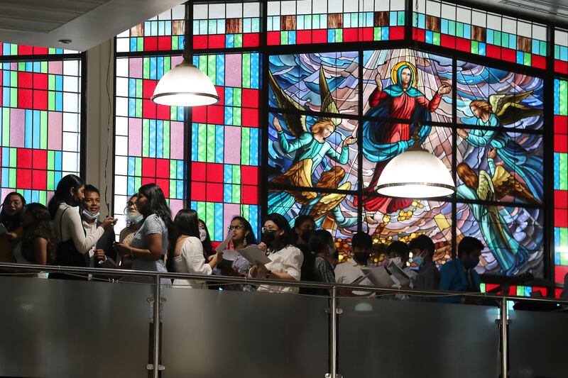 People pray during the Easter Sunday Mass held at St. Mary's Catholic Church in Dubai. Pawan Singh / The National