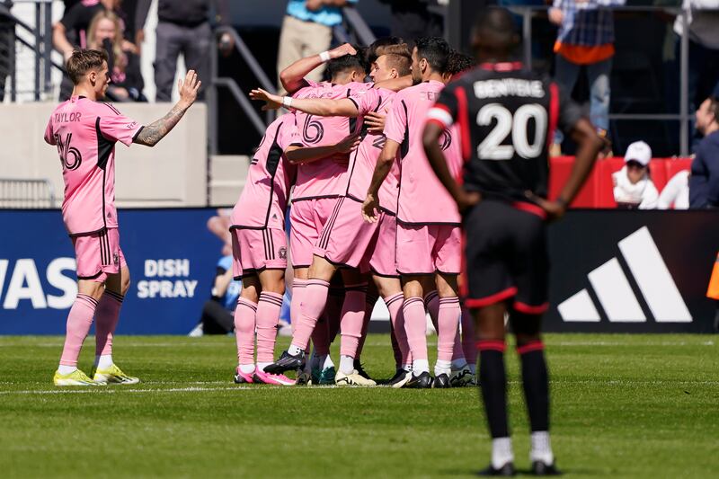 DC United striker Christian Benteke watches as Inter Miami celebrate a goal during the first half. AP