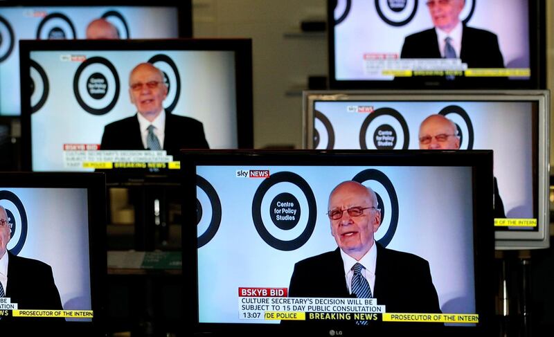 FILE PHOTO: The current Executive Chairman of News Corporation and Executive Co-Chairman of Twenty-First Century Fox, Rupert Murdoch is seen talking on Sky News on television screens in an electrical store in Edinburgh, March 3, 2011. REUTERS/David Moir/File Photo