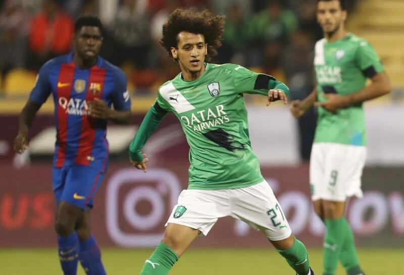 Omar Abdulrahman played for 15 minutes either side of half-time for Al Ahli against Barcelona, scoring from the penalty spot. Karim Jaafar / AFP