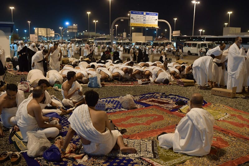 Muslim pilgrims pray at Muzdalifah near the holy city of Makkah.  AFP