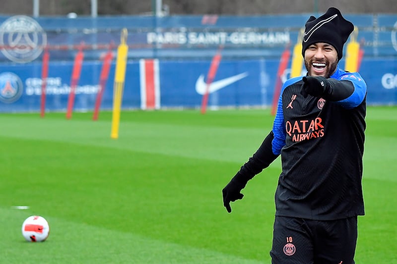 Neymar shares a laugh during Paris Saint-Germain's training session.