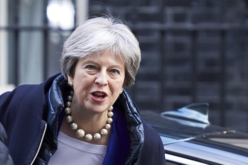 British Prime Minister Theresa May arrives in Downing street for the weekly cabinet meeting on February 6, 2018 in London. / AFP PHOTO / Niklas HALLE'N