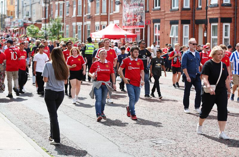 Manchester United fans arrive at Old Trafford on Sunday. Getty