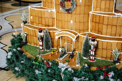 The festive creation of the Burj Khalifa also has model supercars in front of its gingerbread entrance. Courtesy The H Dubai