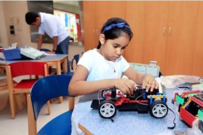 Dana Dias, 7, enjoying a robotics course in Dubai. It is hoped the course will inspire the next generation of inventors and technicians. Sarah Dea / The National