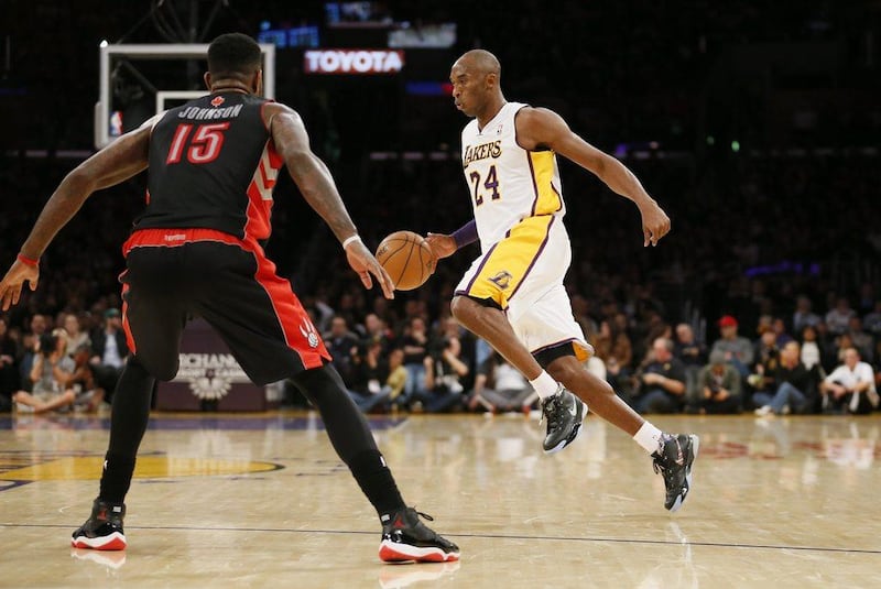 Kobe Bryant had nine points in his first game in eight months for Los Angeles on Sunday. Danny Moloshok / AP