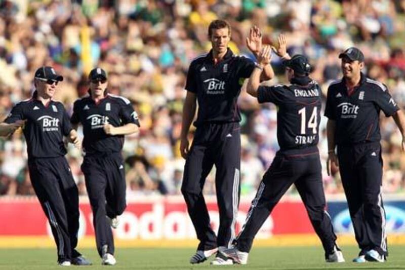 ADELAIDE, AUSTRALIA - JANUARY 26:  Chris Tremlett of England celebrates with team mates after getting the wicket of Brad Haddin of Australia during game four of the Commonwealth Bank One Day International Series between Australia and England at Adelaide Oval on January 26, 2011 in Adelaide, Australia.  (Photo by Morne de Klerk/Getty Images) *** Local Caption *** Chris Tremlett
