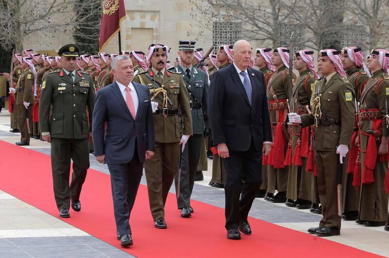 Norway's King Harold, center right, and Jordan's King Abdullah II review an honor guard at the Husayniyah Palace, in Amman, Jordan. AP Photo