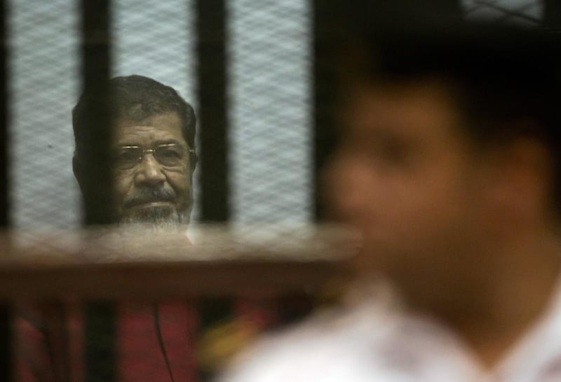 The UK says Mohamed Morsi's leadership had not done enough to pursue democratic commitments while in power. He was jailed for 25 years in 2016. Amr Nabil/AP Photo