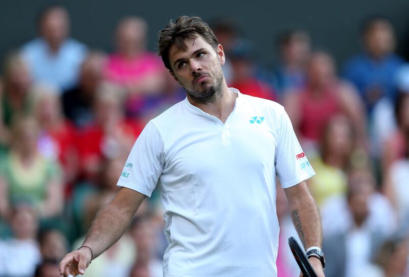 Stan Wawrinka reacts during his match against Daniil Medvedev on Day 1 of the Wimbledon Championships. Steven Paston / Press Association