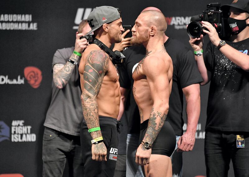 ABU DHABI, UNITED ARAB EMIRATES - JANUARY 22: (L-R) Opponents Dustin Poirier and Conor McGregor of Ireland face off during the UFC 257 weigh-in at Etihad Arena on UFC Fight Island on January 22, 2021 in Abu Dhabi, United Arab Emirates. (Photo by Jeff Bottari/Zuffa LLC) *** Local Caption *** ABU DHABI, UNITED ARAB EMIRATES - JANUARY 22: (L-R) Opponents Dustin Poirier and Conor McGregor of Ireland face off during the UFC 257 weigh-in at Etihad Arena on UFC Fight Island on January 22, 2021 in Abu Dhabi, United Arab Emirates. (Photo by Jeff Bottari/Zuffa LLC)
