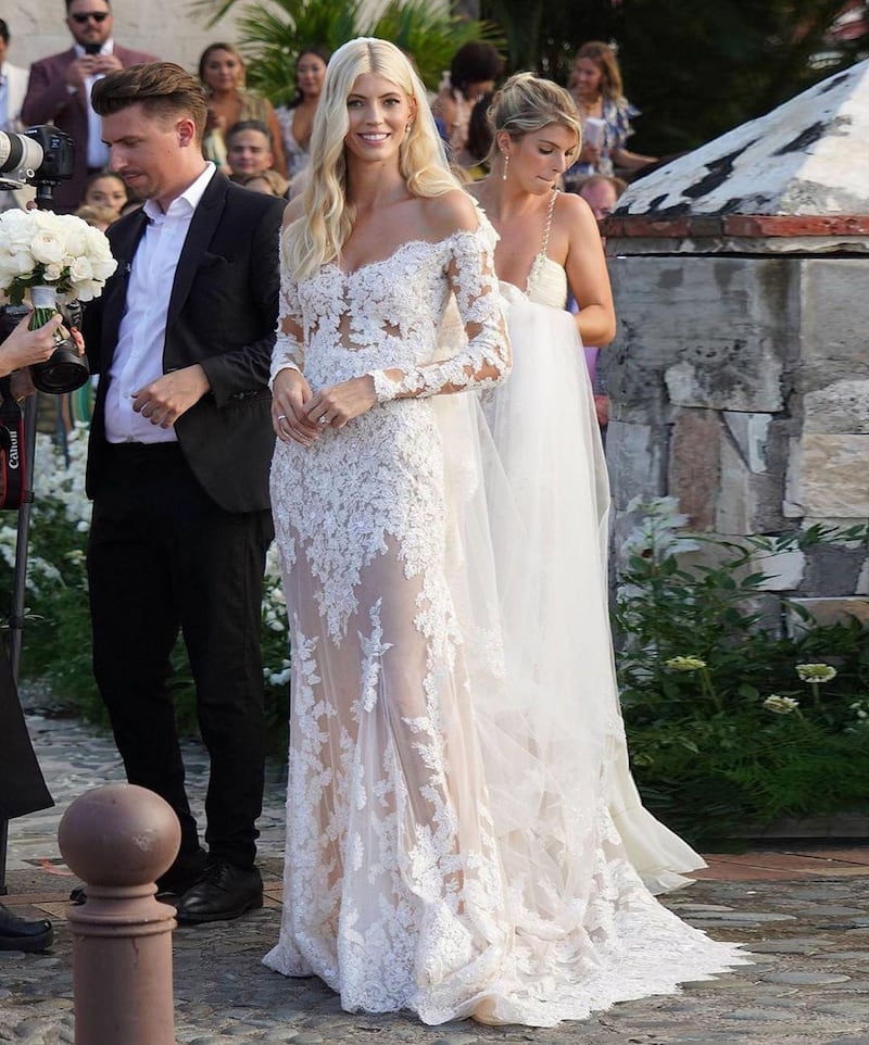 Model Devon Windsor plumped for a sheer tulle and lace creation for her big day. Zuhair Murad / Instagram