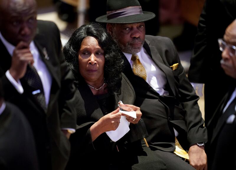 Ms Wells and her husband Rodney Wells at the funeral service. AP