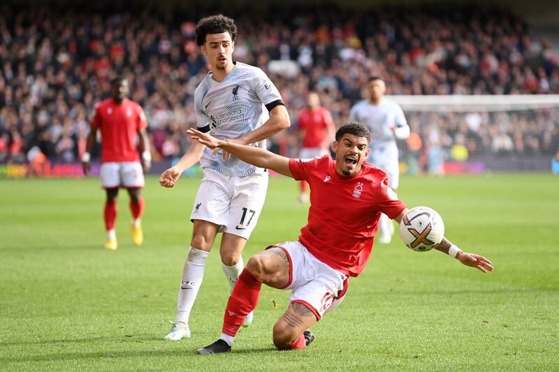 Morgan Gibbs-White of Nottingham Forest battles for possession with Curtis Jones of Liverpool. Getty
