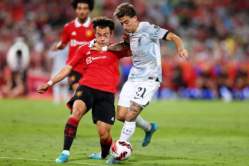 Facundo Pellistri of Manchester United competes for the ball against Konstantinos Tsimikas of Liverpool. Getty 