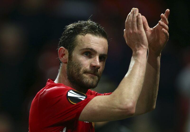 Manchester United's Juan Mata applauds at the end of their Europa League round of 16, second leg, soccer match against FC Rostov at Old Trafford Stadium in Manchester, England, on March 16, 2017. Mata scored the goal in United's 1-0 win. Dave Thompson / AP