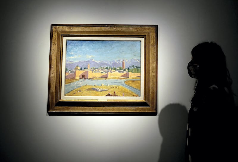An oil on canvas painting by Sir Winston Churchill Painted in Jan. 1943 called 'Tower of the Koutoubia Mosque' is displayed at Christie's auction rooms in London, Friday, Jan. 29, 2021. The painting currently owned by Angelina Jolie, has an estimate of 1,500,000-2,500,000 UK pounds (2,056,489- 3,427,482 US Dollars) and will go up for sale in the Modern British Art Evening Sale at Christie's on March 1, 2021. (AP Photo/Kirsty Wigglesworth)