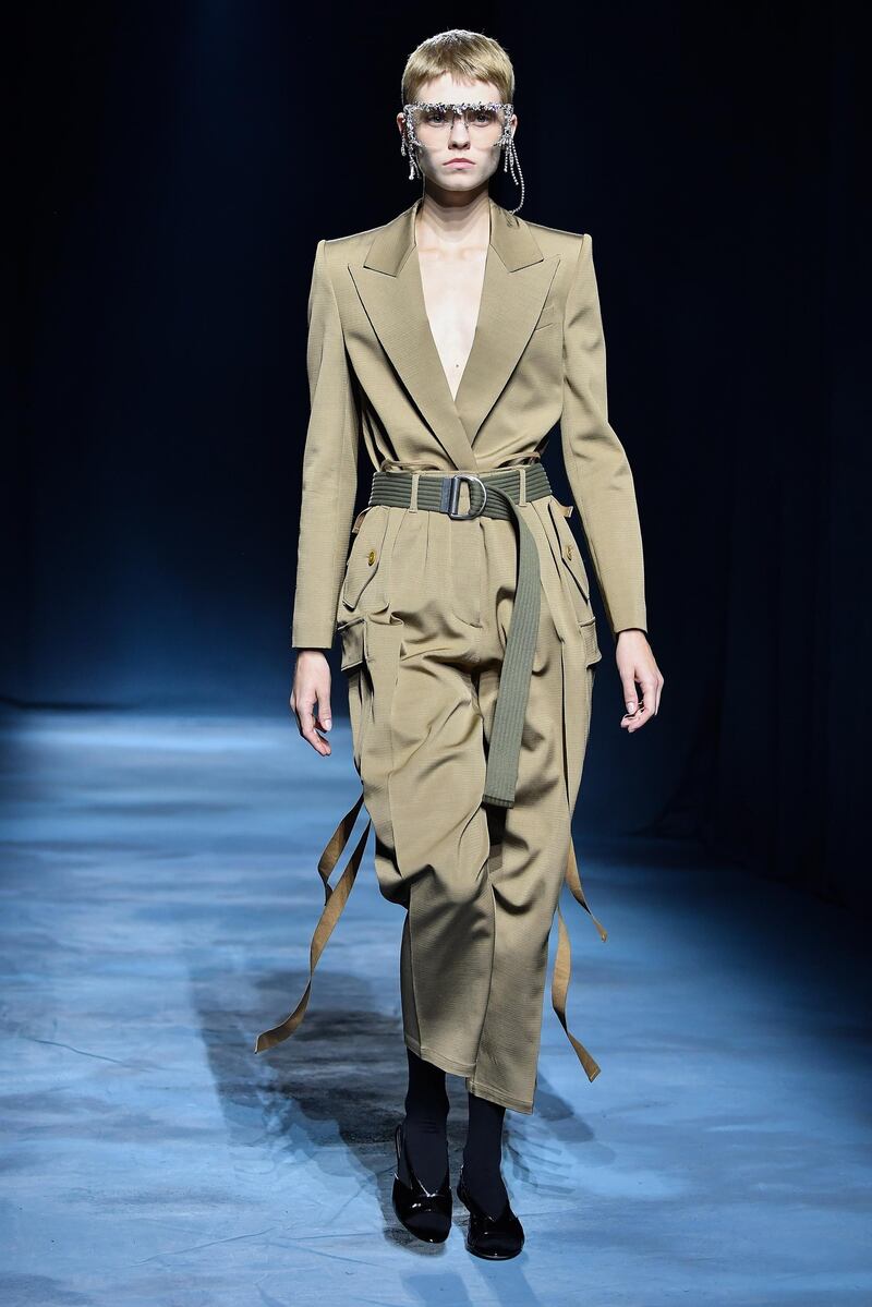 A tuxedo tucked into combat trousers becomes a boiler suit at Givenchy. Pascal Le Segretain. Getty Images