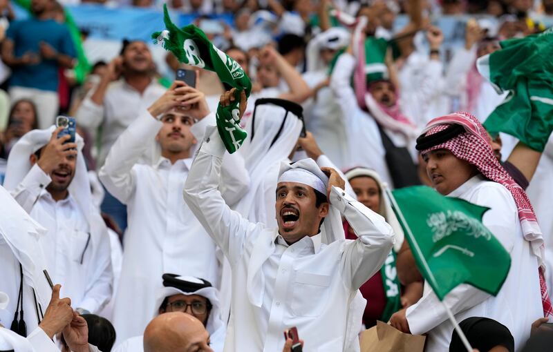 Saudi fans celebrate after their national team beat Argentina 2-1 in the World Cup at the Lusail Stadium in Qatar. AP Photo